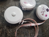 Knit-Tea Retreat branded retractable tape measure